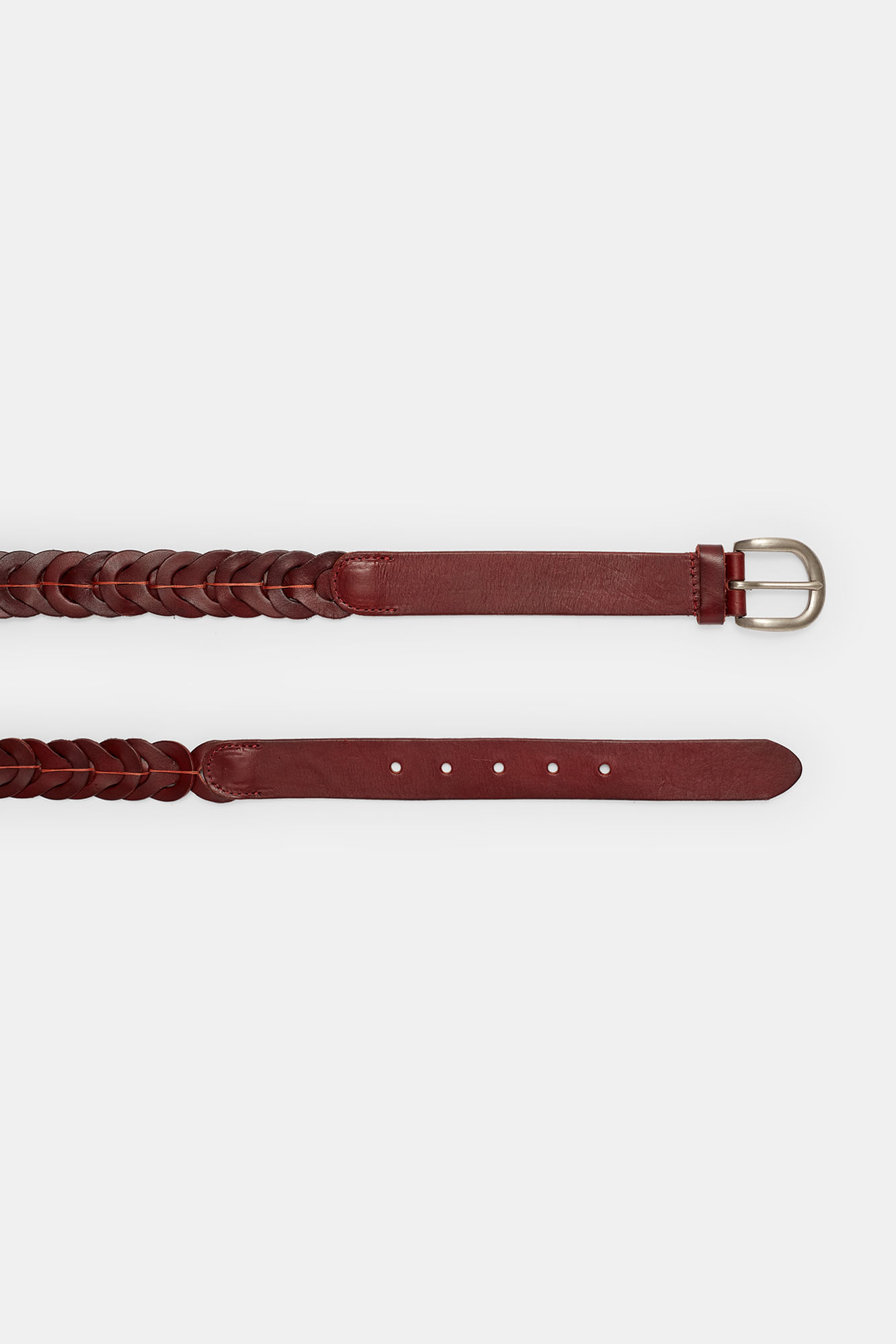 Belt with overlapping leather circles