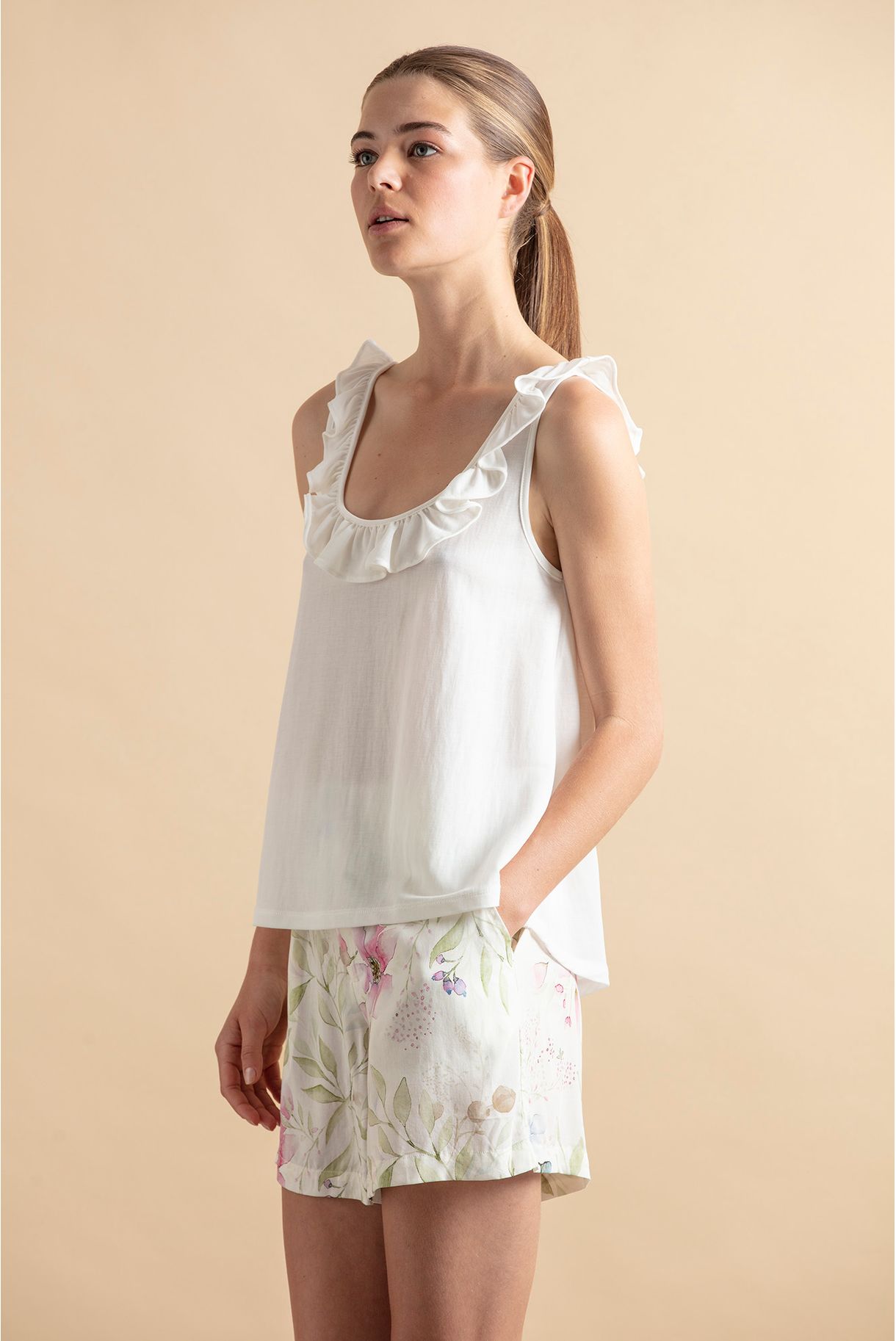 Top with ruffled neckline