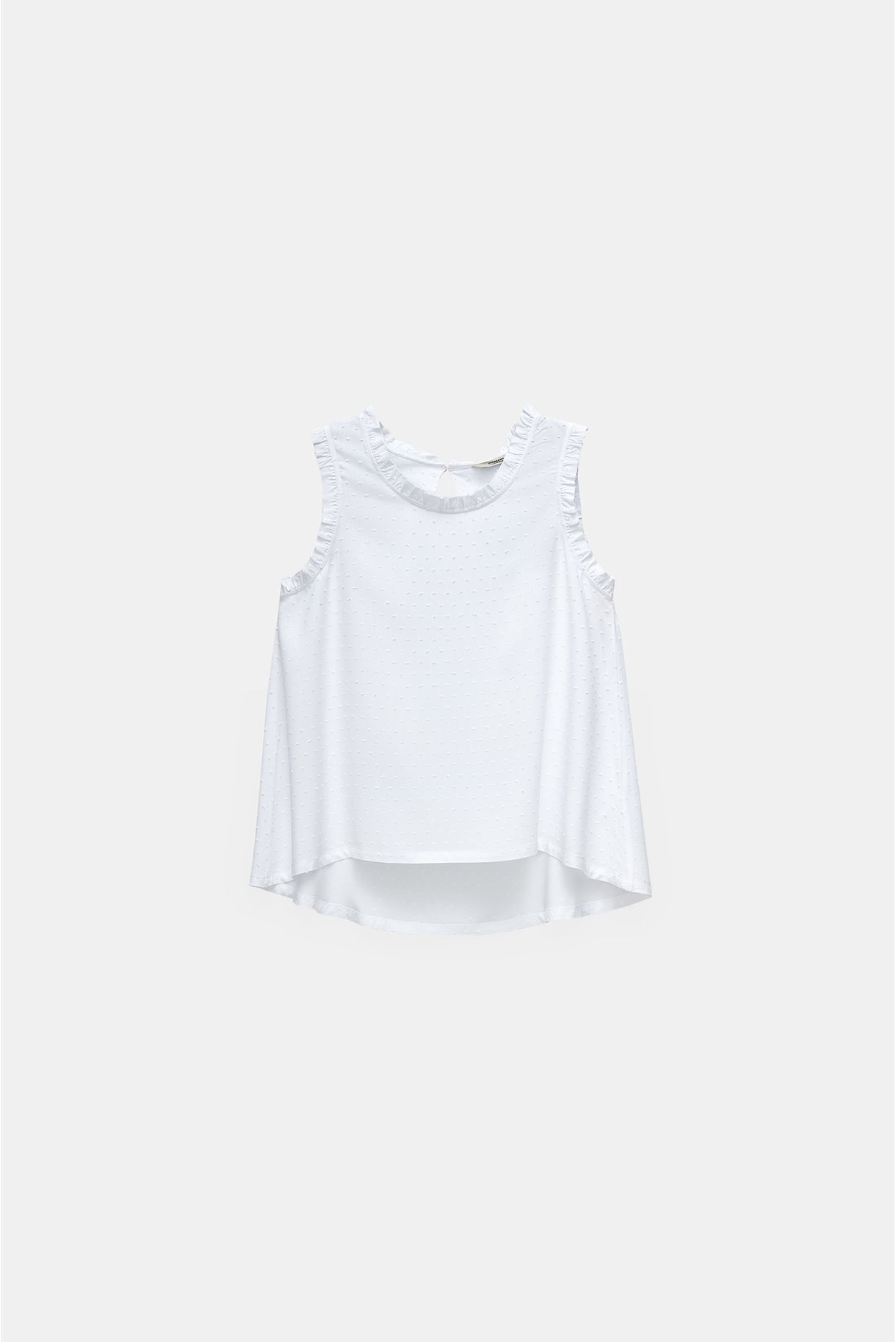 Top with ruffled neckline and sleeves